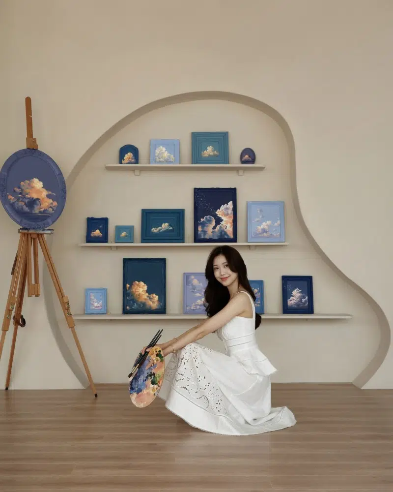 Cathy Camille in front of the NUAGE collection